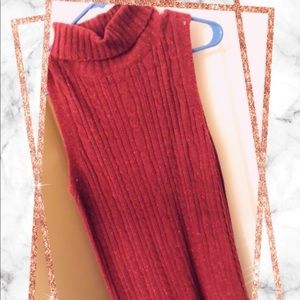 Red sleeveless turtleneck
